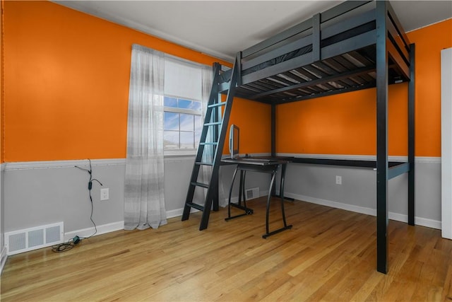 bedroom featuring light hardwood / wood-style floors