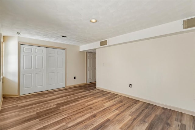 interior space with hardwood / wood-style floors