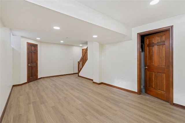 basement featuring light hardwood / wood-style floors