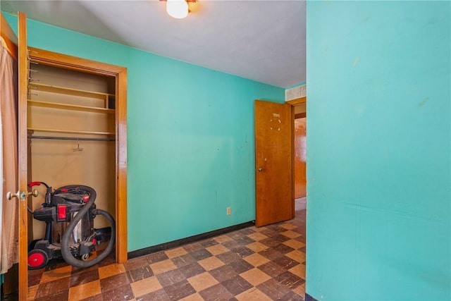 unfurnished bedroom featuring a closet