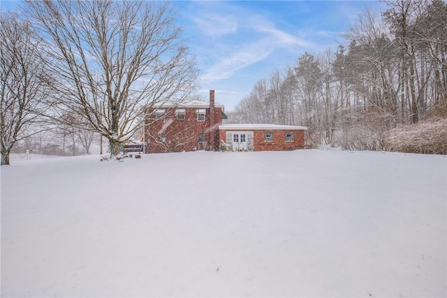 view of yard covered in snow