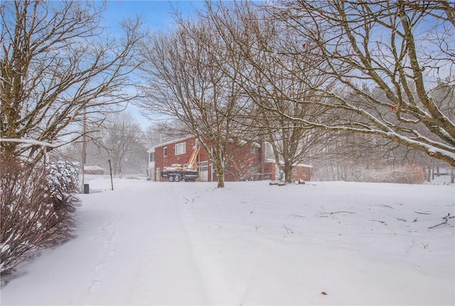 view of snowy yard