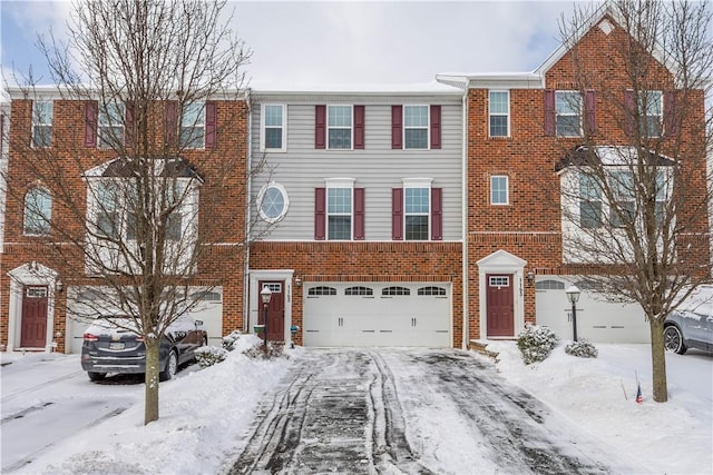 multi unit property featuring a garage