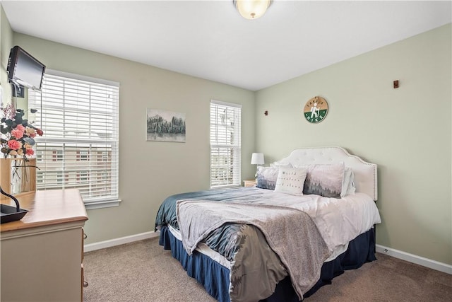 bedroom with light carpet