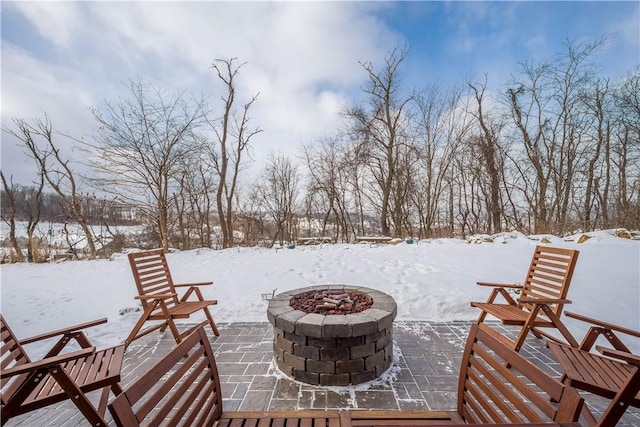 exterior space with a fire pit