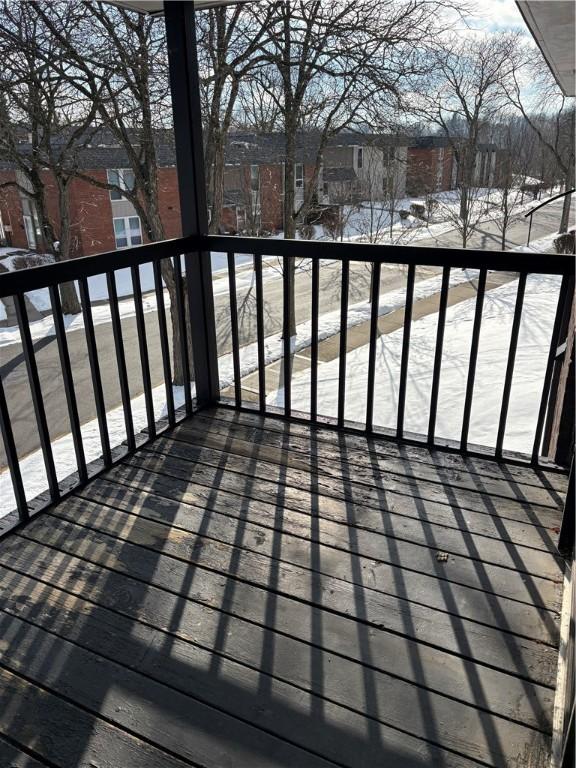 view of snow covered deck