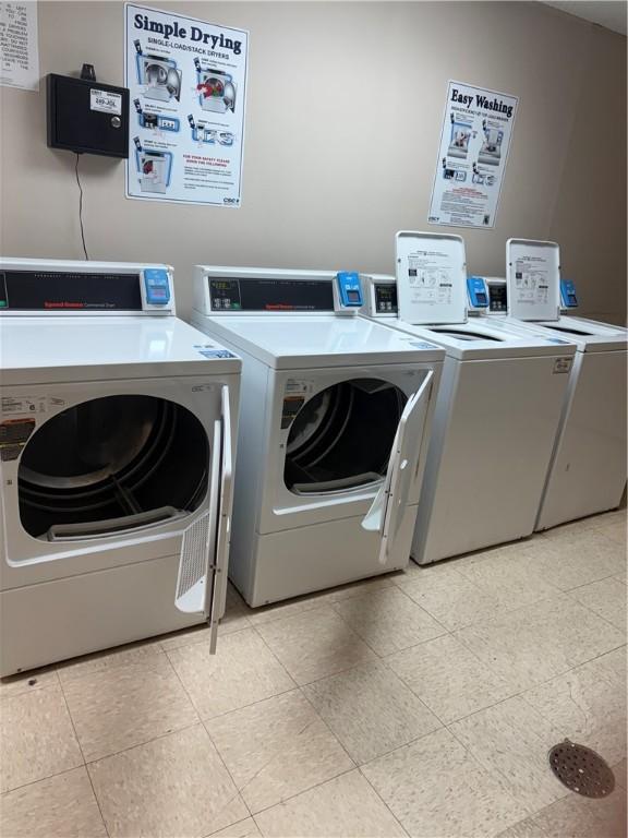 laundry room with washer and dryer