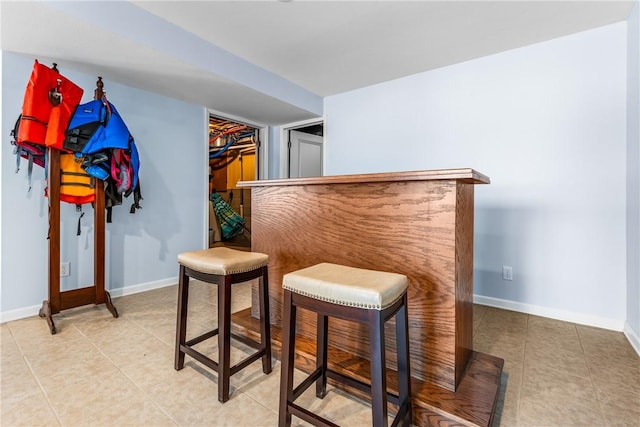 252 Latonka Dr, Jackson Twp Mer, PA 16137 - bar with baseboards and light tile patterned flooring