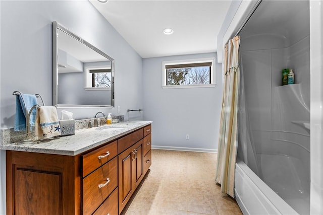 bathroom featuring vanity and shower / tub combo with curtain