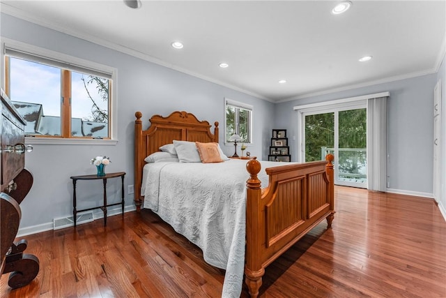 bedroom with crown molding, access to outside, and hardwood / wood-style flooring