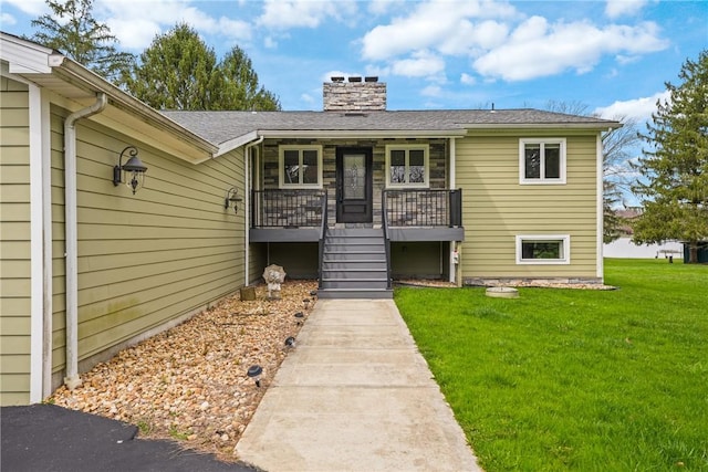 252 Latonka Dr, Jackson Twp Mer, PA 16137 - view of front facade featuring stairway, a chimney, a front lawn, and covered porch