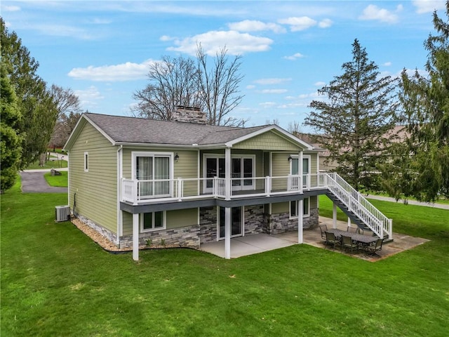 252 Latonka Dr, Jackson Twp Mer, PA 16137 - back of house featuring stairway, a chimney, a yard, central AC, and a patio area