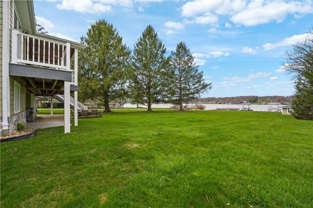252 Latonka Dr, Jackson Twp Mer, PA 16137 - view of yard featuring stairs, a patio, and a water view