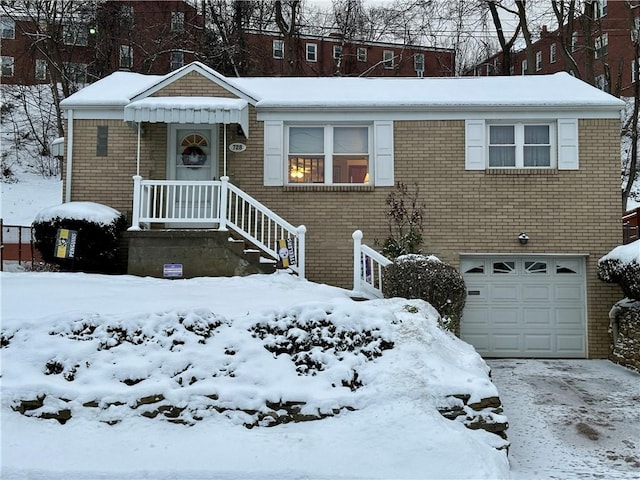 view of front of home with a garage