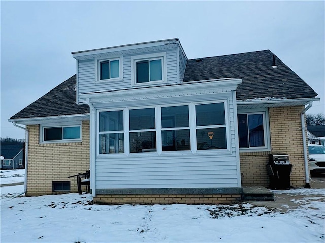 view of snow covered property