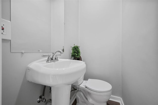 bathroom featuring toilet