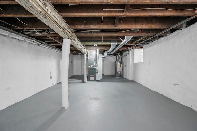 basement with heating unit and water heater