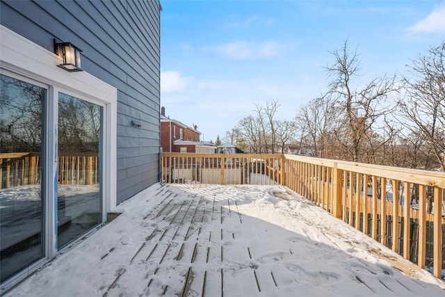 view of snow covered deck