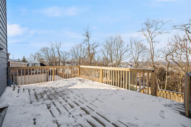 view of snow covered deck