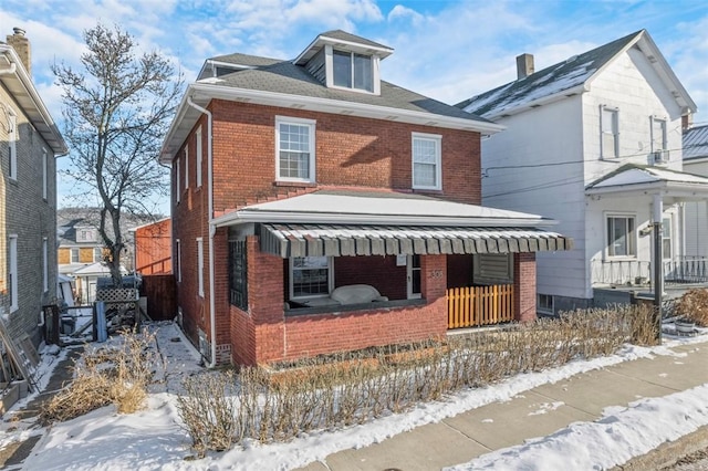 view of property with covered porch