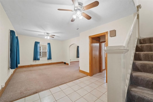 spare room with light carpet and ceiling fan