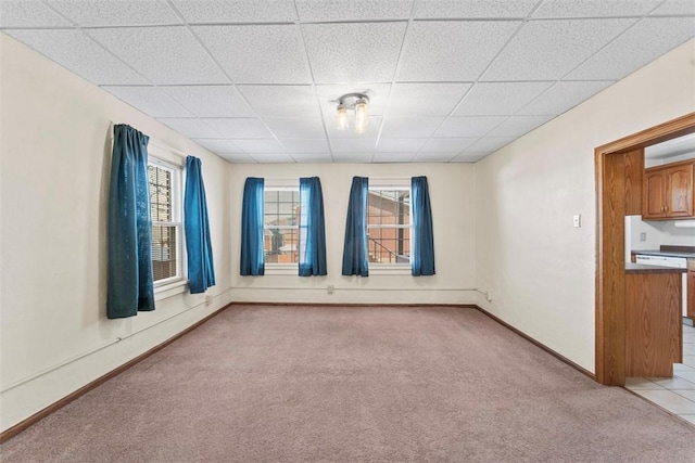 spare room with light carpet