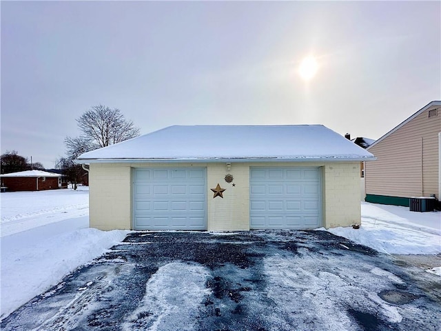 view of snow covered garage