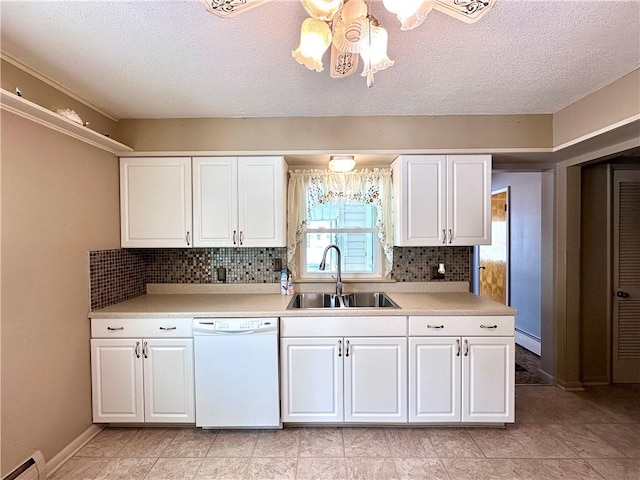 kitchen featuring white dishwasher, sink, white cabinets, and baseboard heating