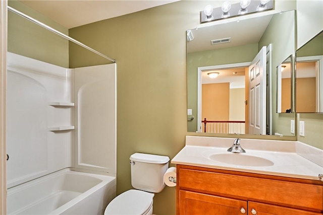 full bathroom with vanity,  shower combination, and toilet