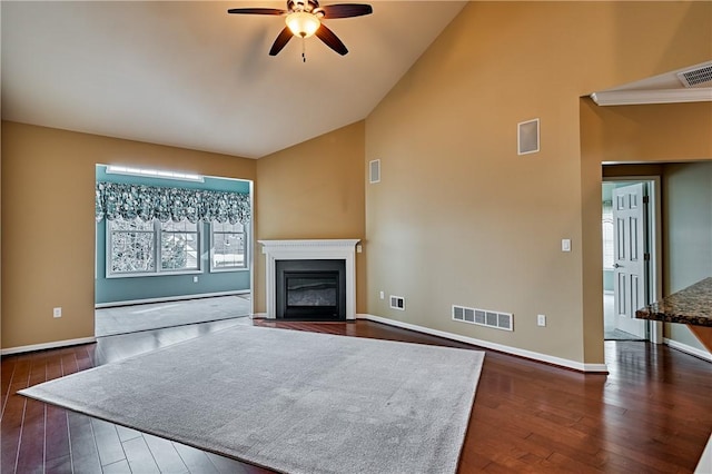 living room featuring high vaulted ceiling, dark hardwood / wood-style floors, and ceiling fan