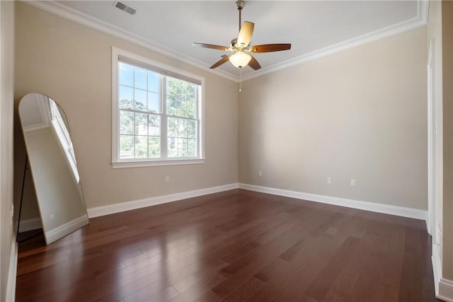 unfurnished room with crown molding, dark wood-type flooring, and ceiling fan