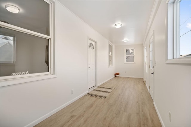 hallway featuring light hardwood / wood-style flooring