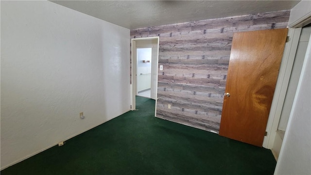 empty room with wood walls