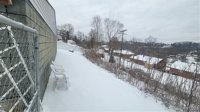 view of yard covered in snow