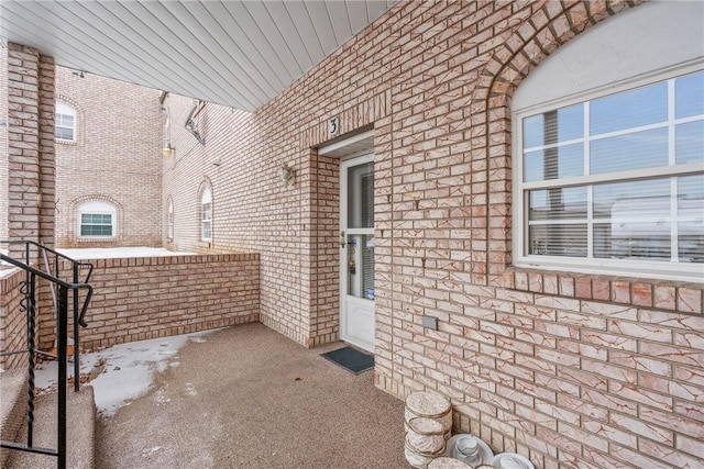 view of side of home with a patio