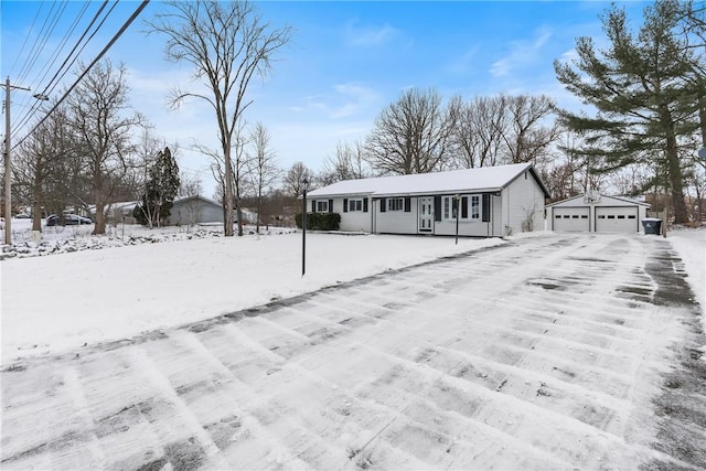 view of front of house featuring an outbuilding and a garage