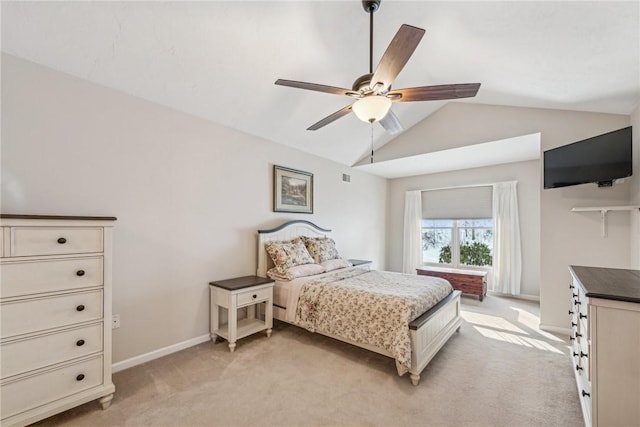 carpeted bedroom featuring lofted ceiling and ceiling fan