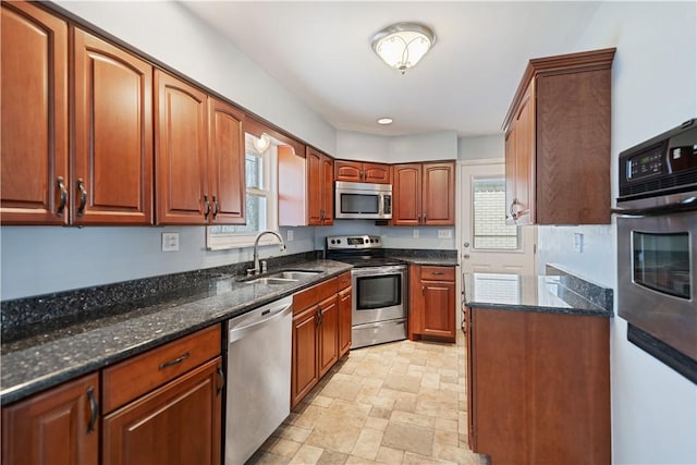 kitchen featuring sink, plenty of natural light, and stainless steel appliances