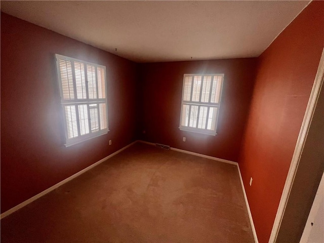 view of carpeted spare room