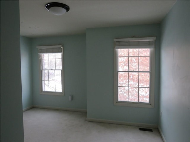 view of carpeted spare room