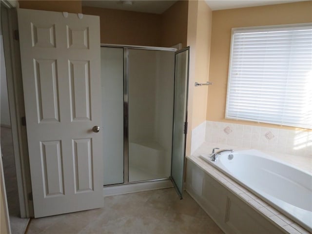 bathroom with independent shower and bath