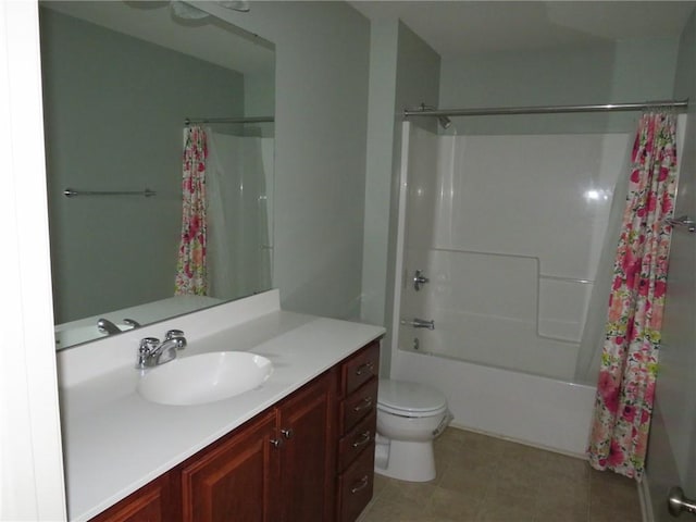 full bathroom featuring vanity, shower / bath combination with curtain, and toilet