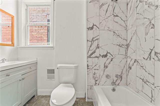 full bathroom featuring vanity, toilet, and shower / bathing tub combination