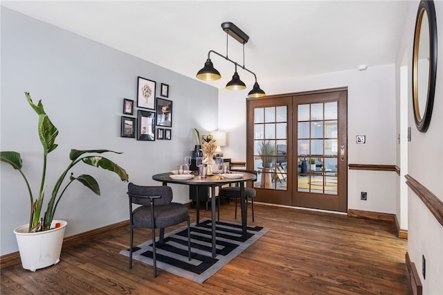 dining room with dark wood-type flooring