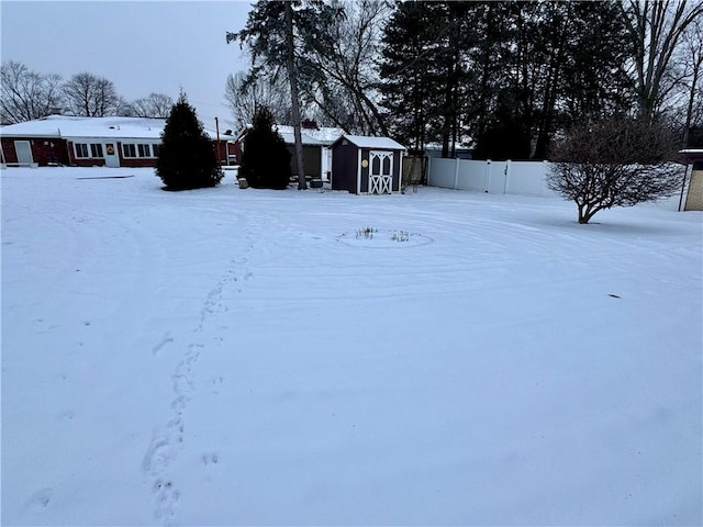 view of yard covered in snow