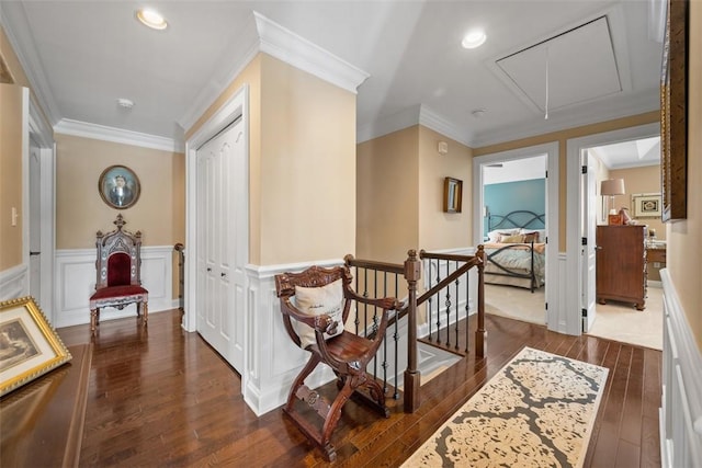 corridor featuring crown molding and dark hardwood / wood-style floors