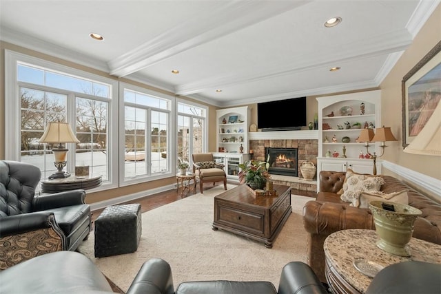 living room featuring beamed ceiling, crown molding, built in features, and hardwood / wood-style flooring