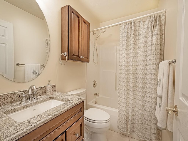 full bathroom with shower / bath combo with shower curtain, tile patterned floors, toilet, and vanity