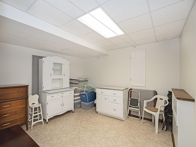 office featuring a paneled ceiling