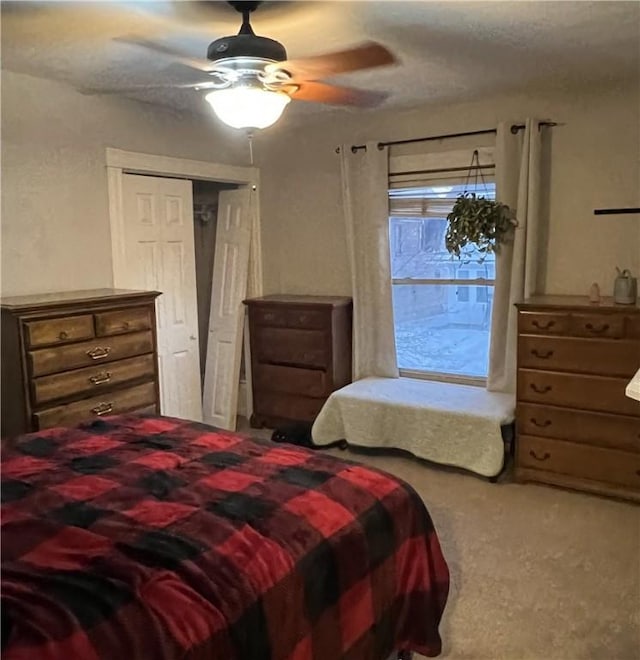 bedroom featuring carpet floors and ceiling fan